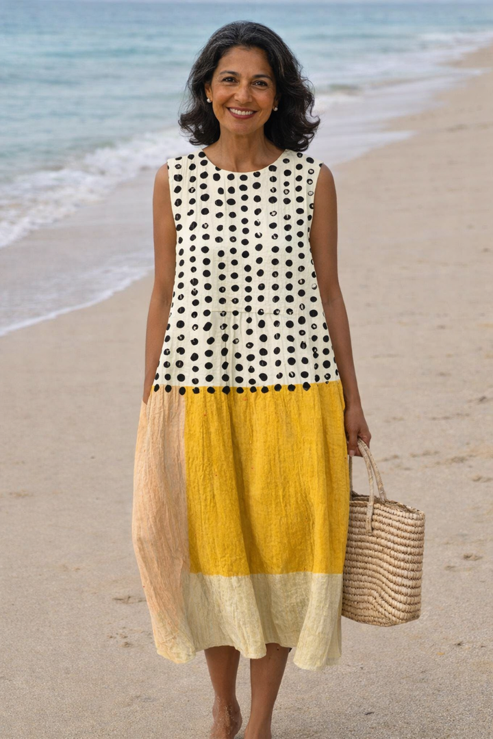 Vera | Vestido midi de bloques de color con lunares